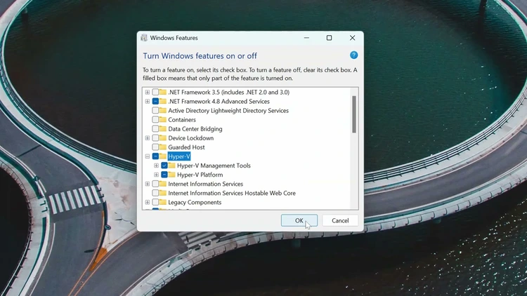 Windows Features dialog with the Hyper-V entry expanded and its components checked, ready to click OK.