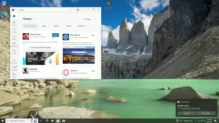 Screenshot of the Microsoft Store showing Firefox successfully installed, with the Open button and an install-complete notification visible