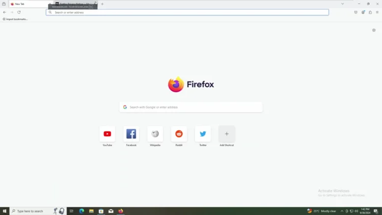Screenshot of Firefox main browser window with the new tab page visible