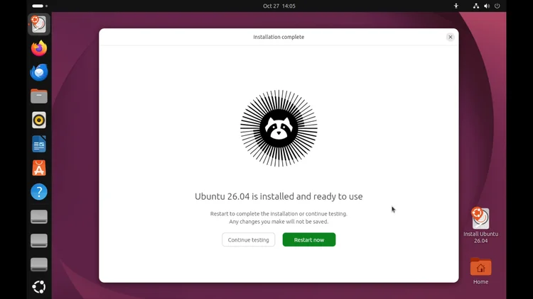 The Ubuntu installer saying Ubuntu 26.04 is installed and ready to use, with Restart now.