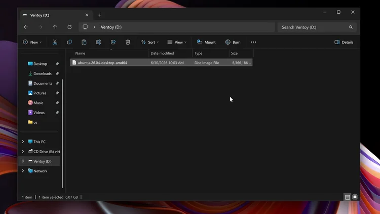 File Explorer showing the Ventoy (D:) drive with the ubuntu-26.04-desktop-amd64 ISO file in it.