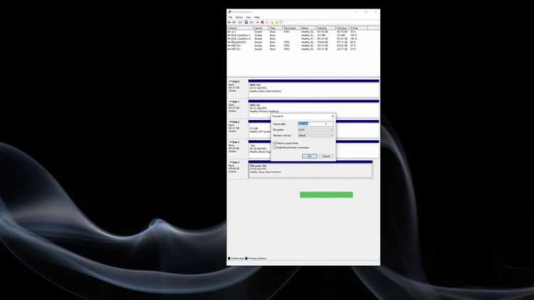 Format dialog box in Windows 10 with NTFS file system selected and Quick Format checkbox enabled.