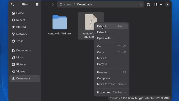 The Files app in the Downloads folder with the right-click menu open on the linux.tar.gz file and Extract at the top of the menu.