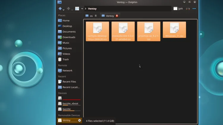 The Dolphin file manager showing the Ventoy drive with four ISO files: cachyos, clonezilla, proxmox and windows 11.