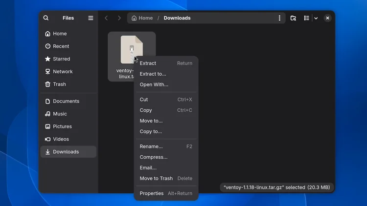 The file manager in the Downloads folder with the right-click menu open on the linux.tar.gz file and Extract in the menu.
