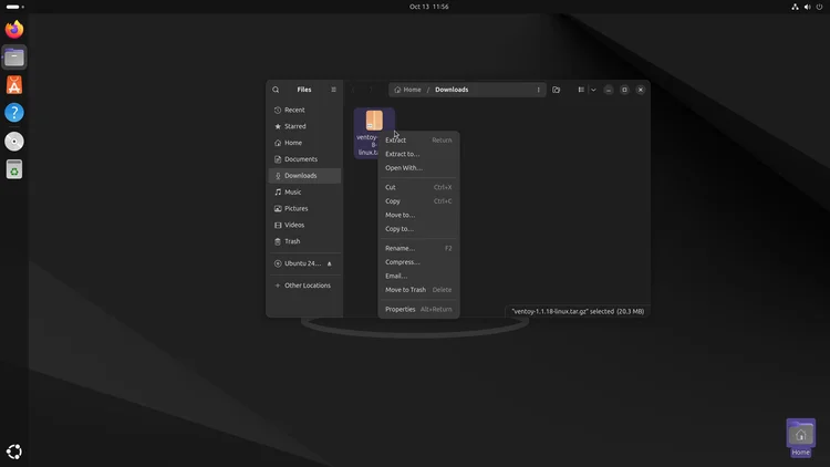 The Files app in the Downloads folder with the right-click menu open on the linux.tar.gz file and Extract at the top of the menu.