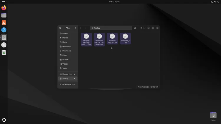 The Files app showing the Ventoy drive with four ISO files: cachyos, clonezilla, proxmox and Windows 11.