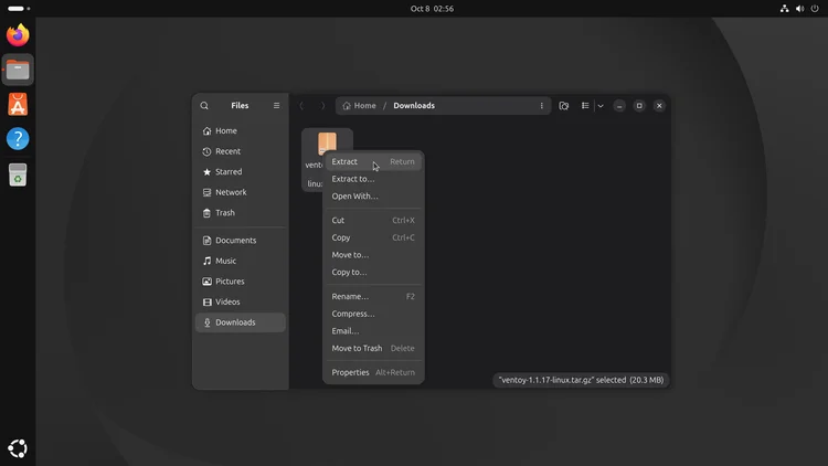 Files app in the Downloads folder with the right-click menu open and Extract highlighted for ventoy-1.1.17-linux.tar.gz.
