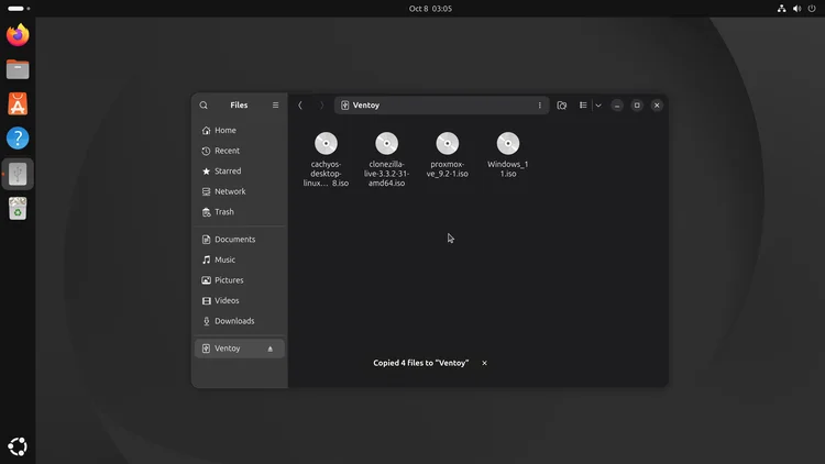 Files app showing the Ventoy drive holding the cachyos, clonezilla, proxmox and Windows 11 ISO files, with a notice that 4 files were copied.
