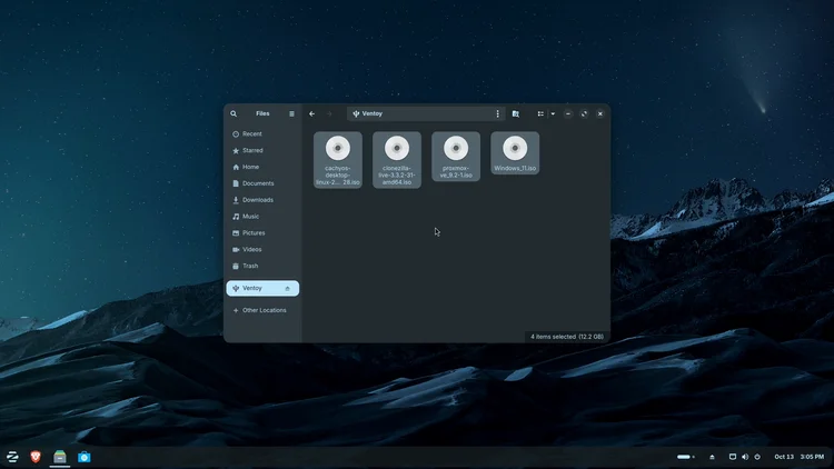 The file manager showing the Ventoy drive with four ISO files, cachyos, clonezilla, proxmox and Windows 11.